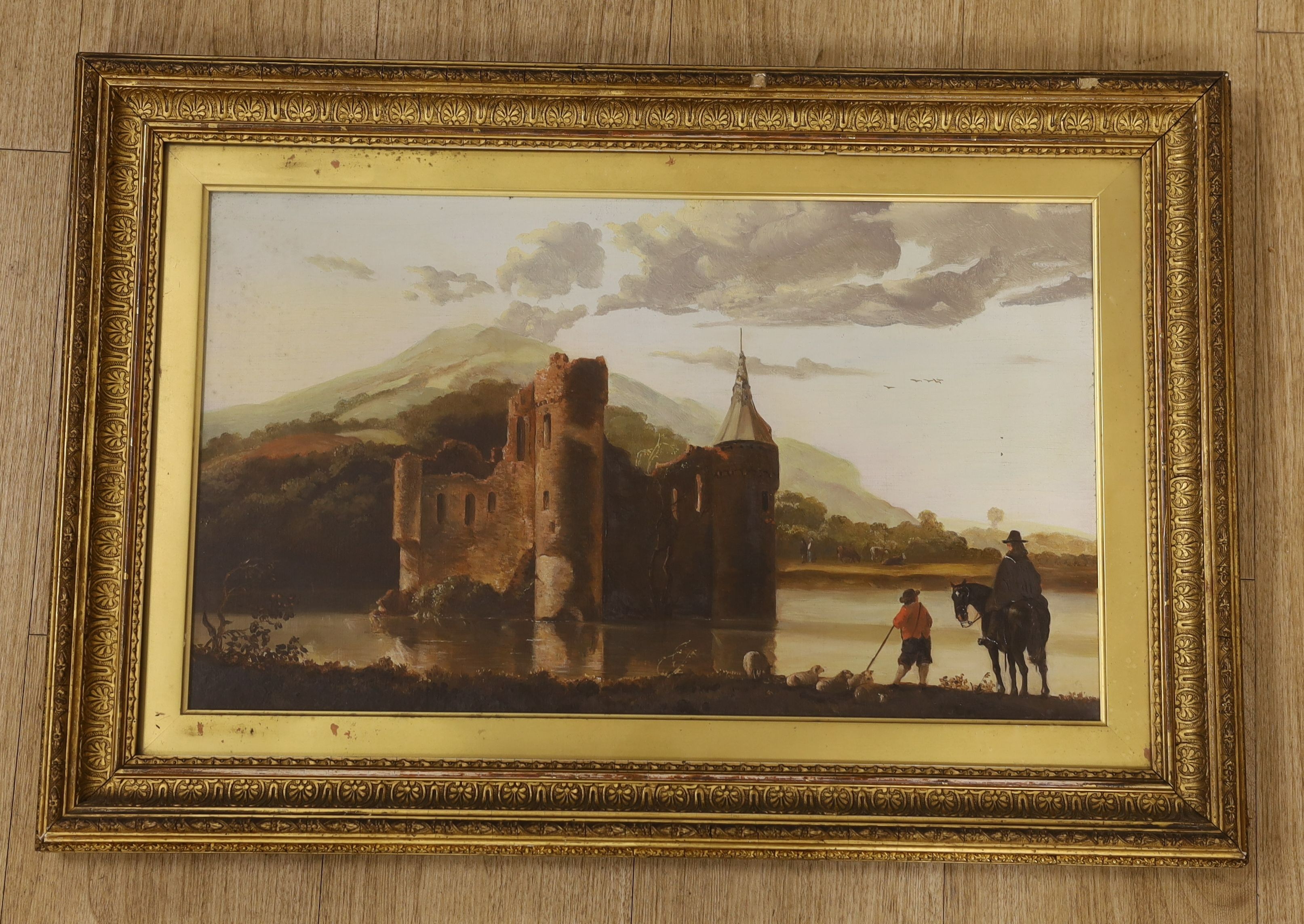 19th century English School, oil on canvas, Flemish landscape with figures overlooking a castle, 30 x 52cm